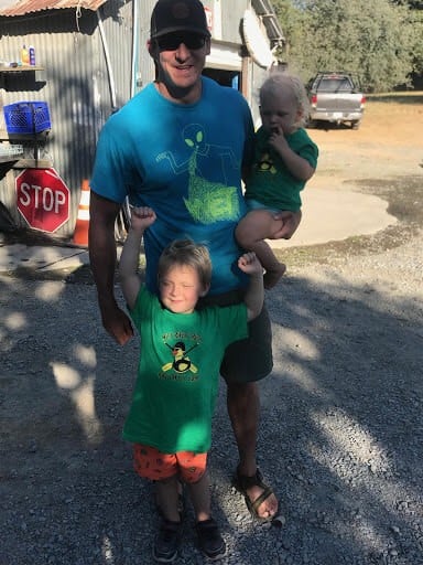 Professional Raft Guide Kyle and his cute kids sporting their WET River Trips T-Shirts