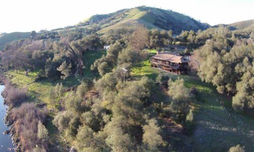 Large rustic home located along the South Fork of the American River in Coloma, CA